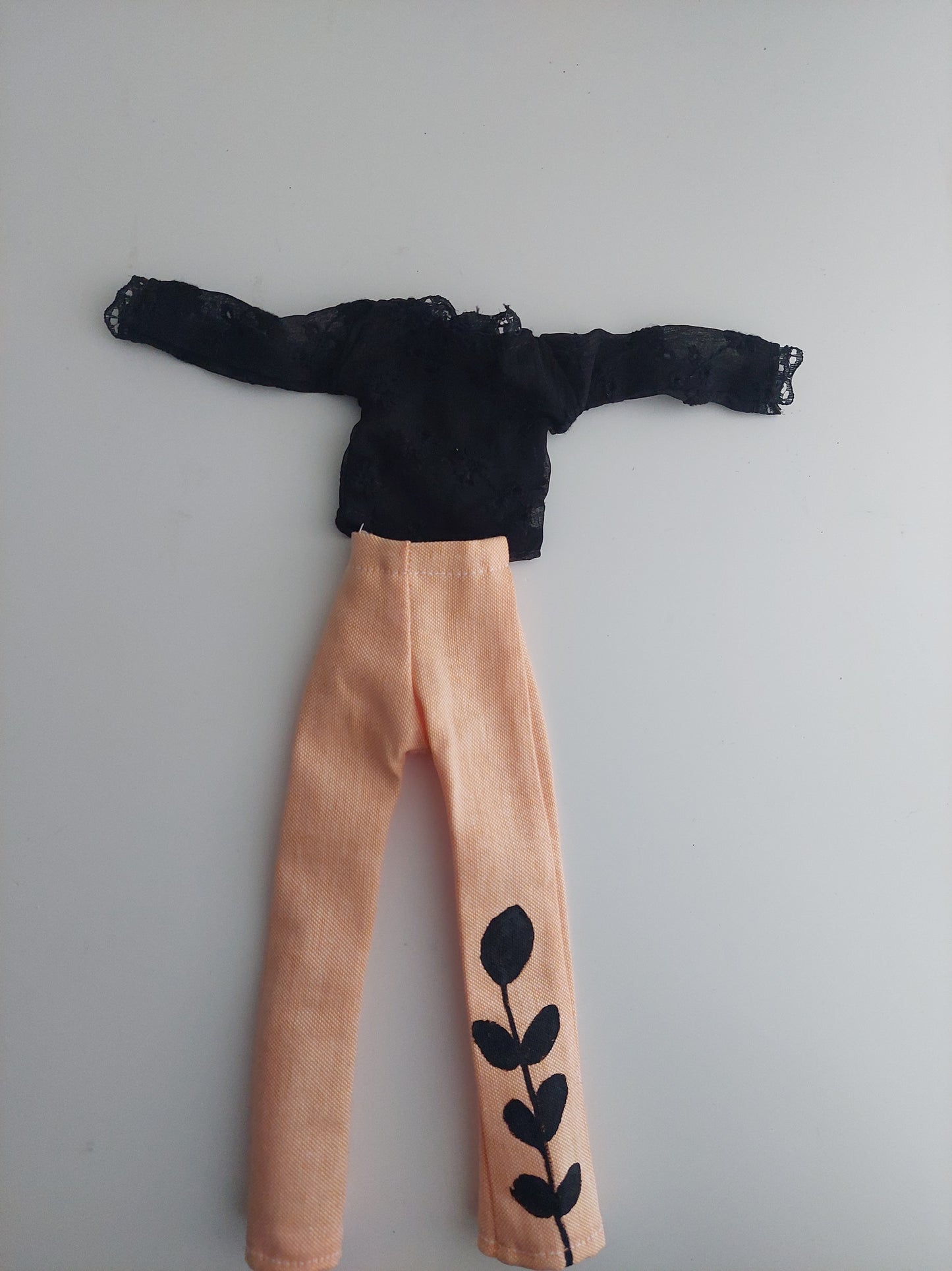 Hand painted peach pants with black blouse